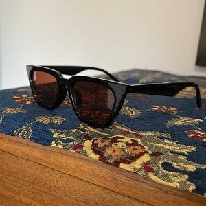 Red-orange lens sunglasses